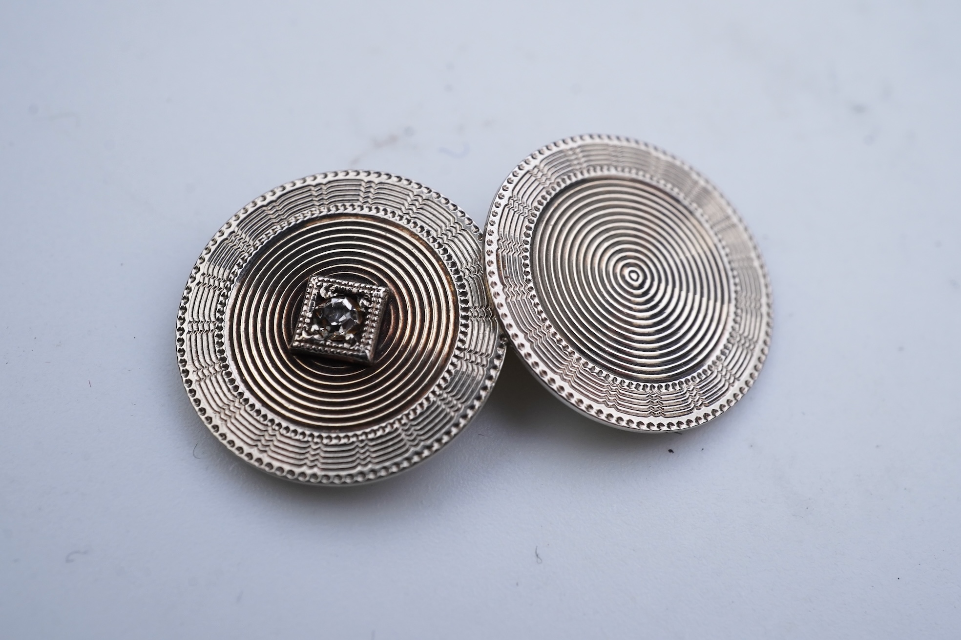 Zeithing, a pair of Art Deco gold and diamond cufflinks, Newark, New Jersey, 1920s